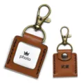 Mini leather photo keychain variant, retro brown square photo album pendant with metal clasp. - Brown