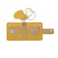 Yellow leather mini photo holder keychain with cute heart cutout design and secure metal snap. - Yellow