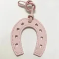 Pink horseshoe leather bag charm pendant, stylish PU leather U-shaped accessory for handbags. - Pink