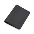 Close up of black pu leather passport holder detail, compact travel document wallet pocket. - Black