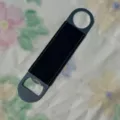 Stainless steel bar blade beer bottle opener with black PU leather wrap and hanging hole. - Black