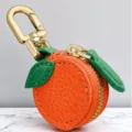 Mini orange shaped PU leather coin purse cute fruit key chain bag charm with zipper hook. - Orange