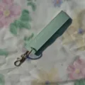 Light green PU leather keychain strap wristlet with gold metal hardware for car keys daily. - Green