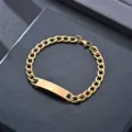 Close up detail of the golden stainless steel cuban link ID bracelet with blank plate. - 1.8 Curved Tag Bracelet / 20cm / Gold