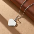 Stainless steel two-in-one smooth heart pendant necklace, minimalist design, detailed closeup view. - Steel Heart
