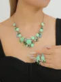 Mint green camellia flower necklace and earrings set with rhinestones and pearls. - Emerald Green Set