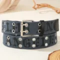 Gothic letter canvas belt detail view showing retro double metal eyelets and pin buckle. - Gray