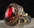 Vintage red cabochon ring with dual-tone black gold plating and intricate carved details. - Size 6 / Copper And Black Two-Tone