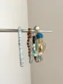 Bohemian multi-layer beaded bracelet detailed view, featuring mixed materials and cute heart charm. - Style B Wood Bead Heart Tassel (SL0449)