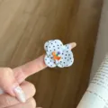 Enamel polka dot flower open ring, handmade metal jewelry detail view showing elegant style. - White Polka Dot Flower (JZ1068B)