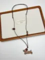 Cute puppy pendant and adjustable wooden bead on this chic Korean style brown cord necklace. - Enamel Dachshund Necklace (XL1791)
