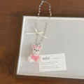 Charming pearl beaded rabbit necklace detail showing cute pink bow and delicate heart chain. - Pink Rabbit Style (XL4960B)