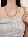 Close-up of colorful floral beaded clavicle necklace, summer dopamine style jewelry detail. - Beaded Flower Style (XL3737)