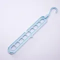 Space-saving 9-hole multifunctional plastic clothes hanger in light blue color finish - 400 Pieces/Pack / Blue