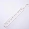 Durable white space-saving 9-hole multifunctional folding clothes hanger for closet storage - 400 Pieces/Pack / Beige