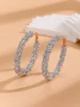 Sparkling crystal encrusted large hoop earrings detail view showing the exquisite craftsmanship. - Silver