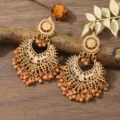 Bohemian vintage gold hollow long earrings with elegant nude beaded tassel drop design. - Coffee With KC Gold