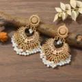 Bohemian style gold hollow bell dangle earrings featuring white pearl tassels detail. - Light KC Gold