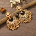 Bohemian gold-toned hollow drop earrings with intricate filigree crescent design and hanging beads. - Middle KC Gold