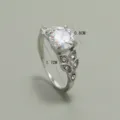 Exquisite six-prong simulated diamond ring detail, sparkling stone with leaf accent. - White 17# White Gold Finish M200