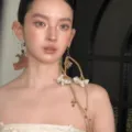 Close-up detail of artistic vintage asymmetric long tassel earrings with dried flowers. - Dried Flower Style (EH2477)