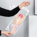 Ramo de tulipanes tejidos a mano en bolsa transparente, elegante flor de ganchillo para regalo. - Tulipán Relleno Rosado Oscuro