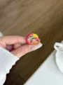Closeup detail of the colorful enamel bird ring, highlighting vibrant tones and fine metalcraft. - Rose Pink Parrot Style (JZ0875C)
