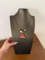 Close up of a cute watermelon slice resin pendant necklace with colorful beads on cord. - Watermelon Style
