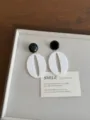 Vintage style statement earrings with black round studs and white hollow resin drops for chic. - Oval Black White Style(EH3316)