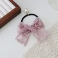Chouchou élégant avec nœud en dentelle rose et perle, style forêt délicat - Vieux rose