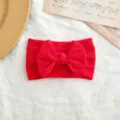 Soft elastic nylon baby headband with a vibrant red bow and a cable knit detail - Twisted Bowknot Style / Red