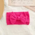 Diadema para bebé de nailon elástico rosa intenso con lazo y trenzado - Estilo de Lazo Torcido / Rosa rojo