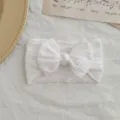 Diadema elástica de nailon blanco para bebé con patrón de trenzas y lazo grande - Estilo de Lazo Torcido / Blanco