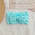 Diadema elástica de nylon para bebé con lazo de punto trenzado en azul claro - Estilo de Lazo Torcido / Azul cielo