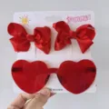Rote Herz-Sonnenbrille und Schleifen-Haarspangen-Set für Kinder in roter Gelee-Optik - Set aus Haarspange und Sonnenbrille / Transparentes Rot