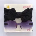 Süßes Kinder-Set mit schwarzem Schleifen-Stirnband und lila Herz-Sonnenbrille mit Verlauf - Stirnband- und Brillenset / Schwarz/Lila
