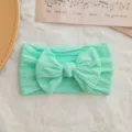 Diadema suave para bebé color verde menta con lazo de nailon elástico y trenzado - Estilo de Lazo Torcido / Verde menta