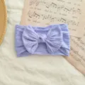 Diadema elástica de nailon para bebé en color lavanda con lazo de punto trenzado - Estilo de Lazo Torcido / Lavanda