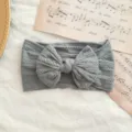 Diadema elástica gris para bebé de nailon con un gran lazo trenzado - Estilo de Lazo Torcido / Azul grisáceo