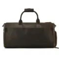 Detail view of the brown leather travel duffel bag highlighting premium texture and sturdy stitching. - New Dark Brown
