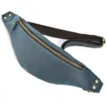 Close-up detail of the vintage blue crazy horse leather chest bag with brass metal hardware. - 1033-Crazy Horse Leather Blue
