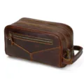 Vintage leather toiletry bag detail closeup showing double zipper and sturdy side handle design. - 9544-Premium Coffee Leather