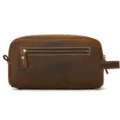 Detail view of brown leather dopp kit, featuring smooth metal zipper and durable stitching texture. - 9533 - Crazy Horse Coffee