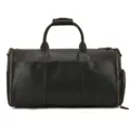 Dark brown leather travel duffel bag detail, premium vintage luggage with sturdy metal zippers. - Dark Brown
