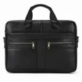Closeup of black leather business briefcase with dual handles and front zipper pockets. - 3316 / Black