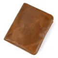 Vintage brown men's leather wallet with multi card slots and premium texture detail view. - Brown
