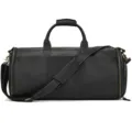 Detail view of the black leather travel duffel bag, showing fine stitching and smooth zippers. - Black