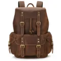 Vintage brown leather backpack detail showing premium mad horse leather texture and brass hardware. - 9499 Brown