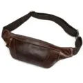 Detailed view of the brown leather chest bag showing fine texture and durable strap. - Style 1034 / Oil Leather Coffee