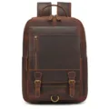 Close up view of vintage crazy horse leather backpack with detailed straps and metal buckles. - 1829-Brown